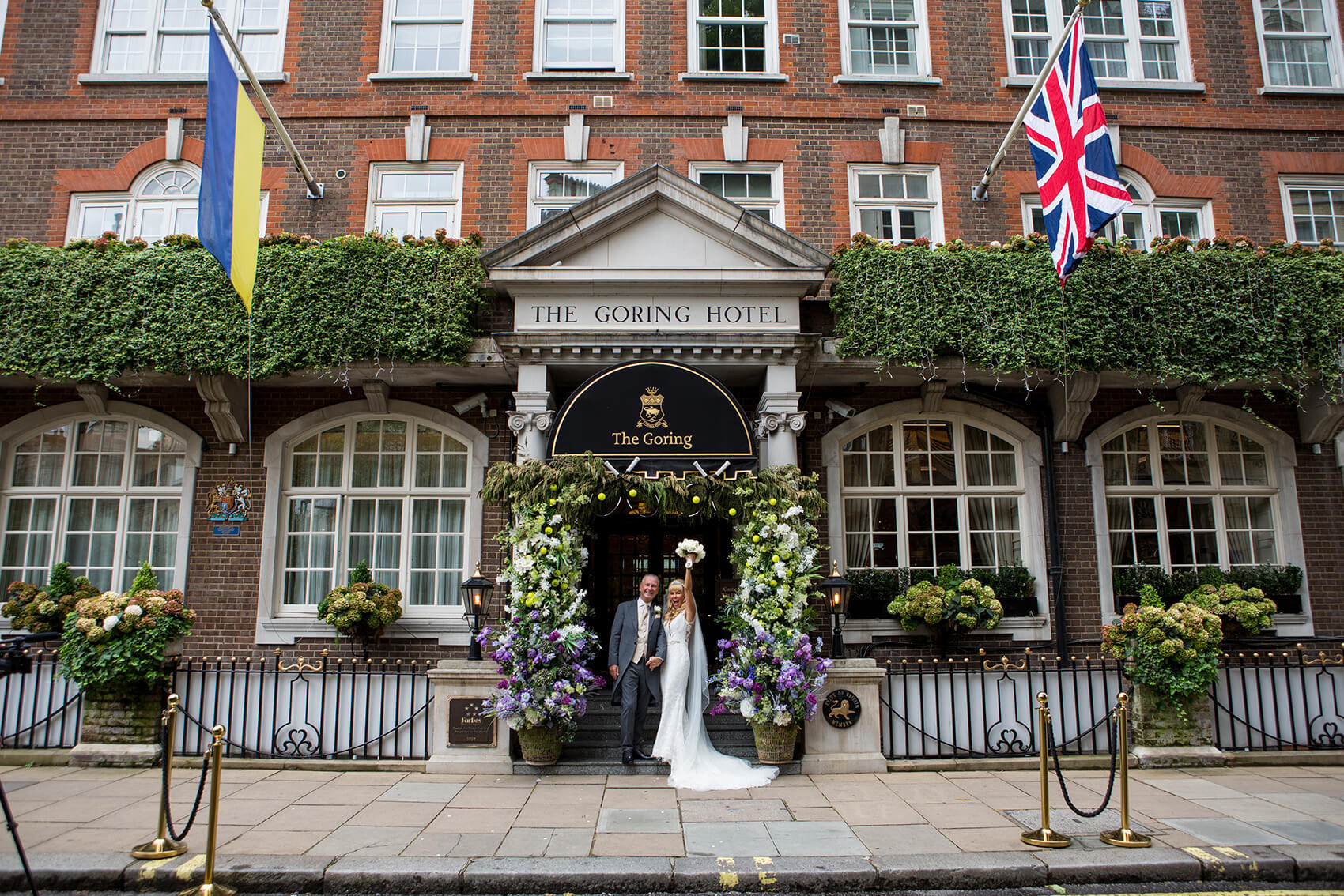 Bride and groom in front of The Goring Hotel