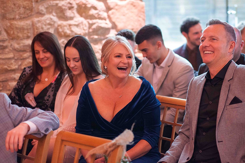 Happy smiling guests at a wedding