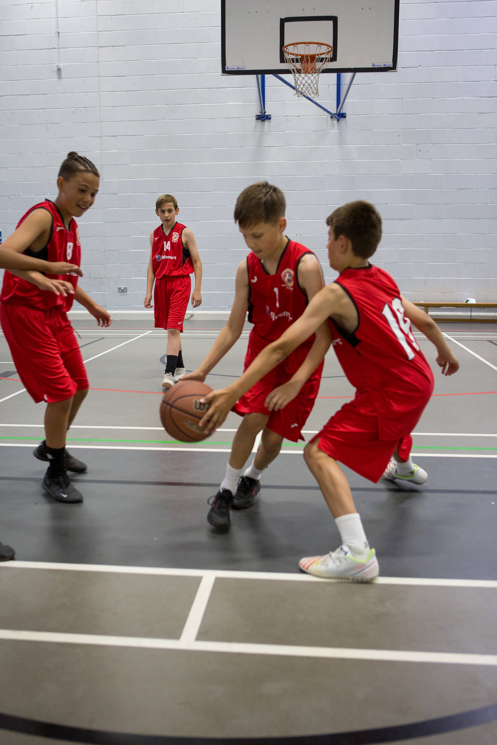 Children playing basketball