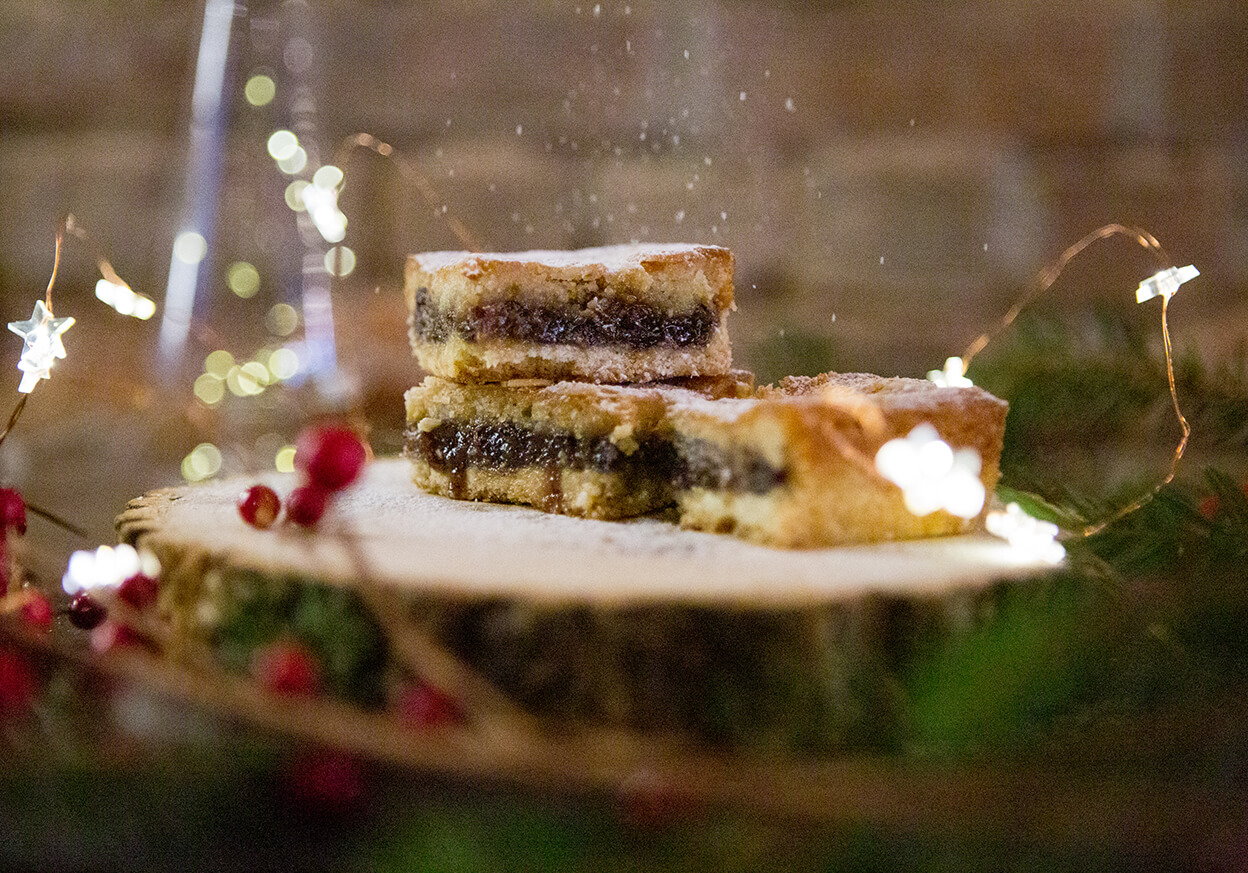 Slice of cake on a wooden platform