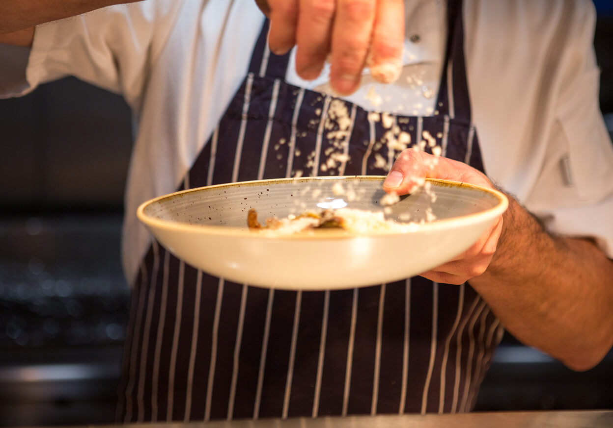 Chef preparing a fresh dish