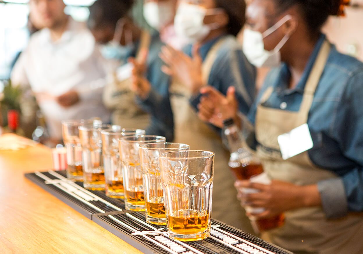 Drinks being made at a bar