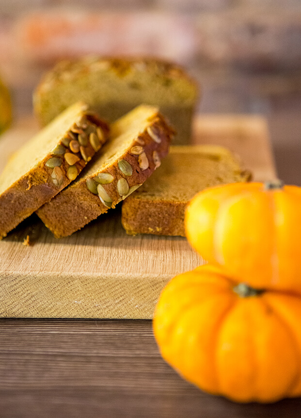 Slices of cake on a wooden chopping board