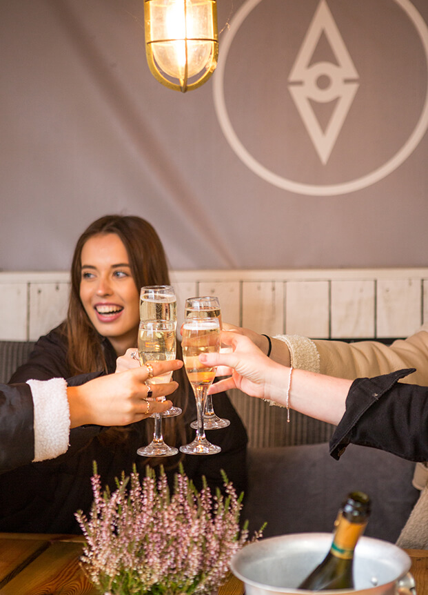 A toast being share with glasses of champagne