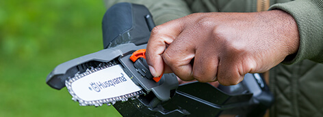 A man using a gardening tool