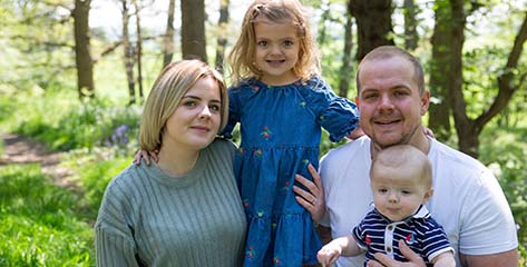 Family portrait out in the woods