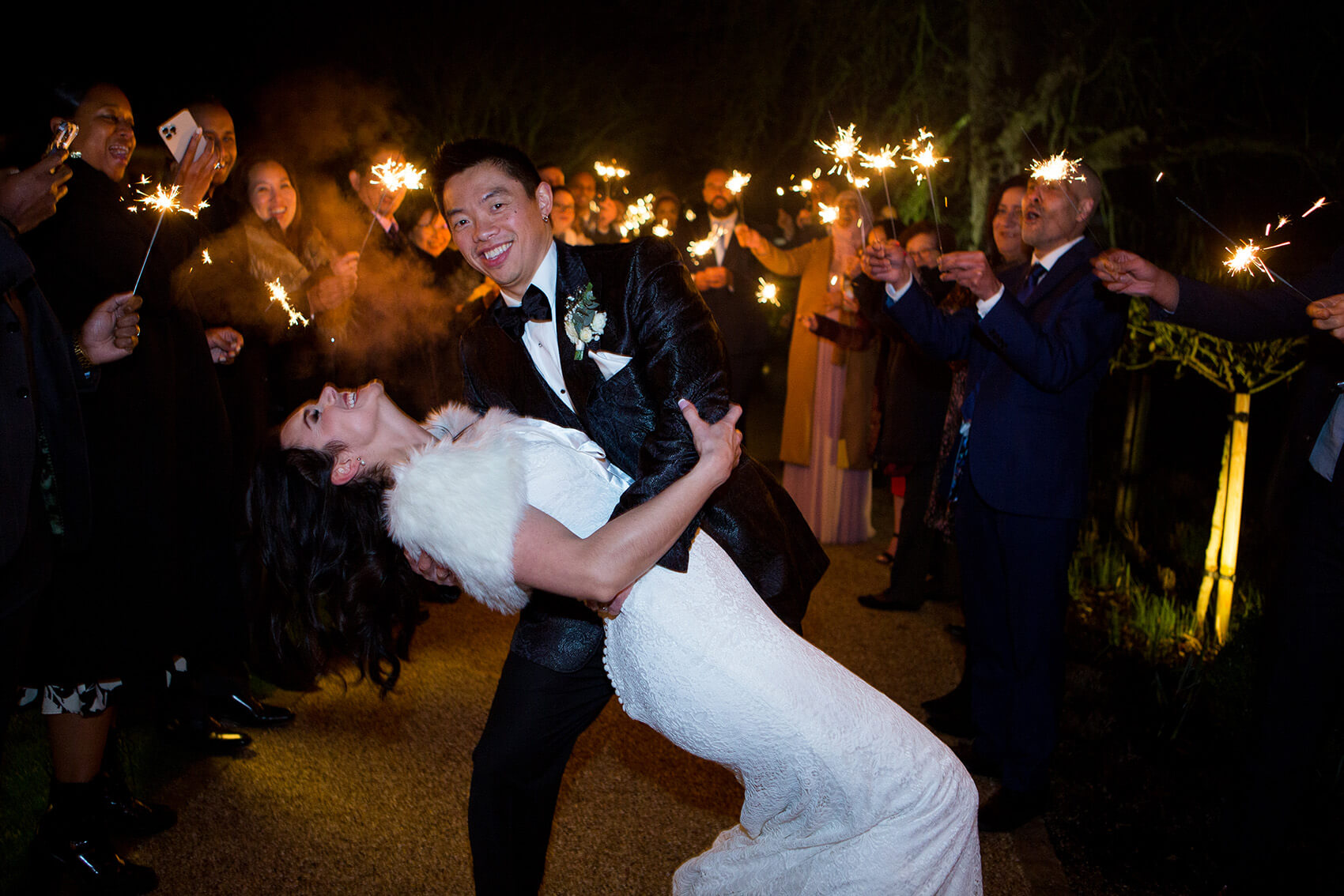 Bride and groom dancing in the evening