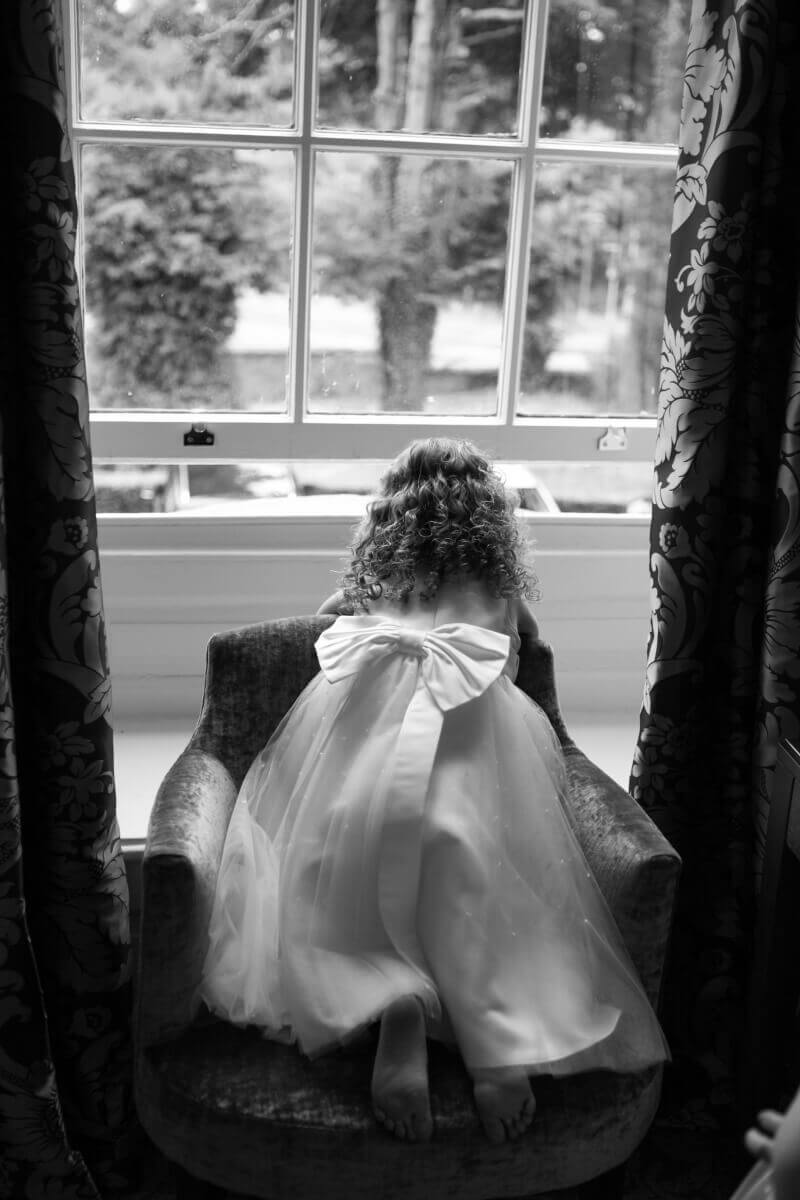 Bridesmaid looking out of the window