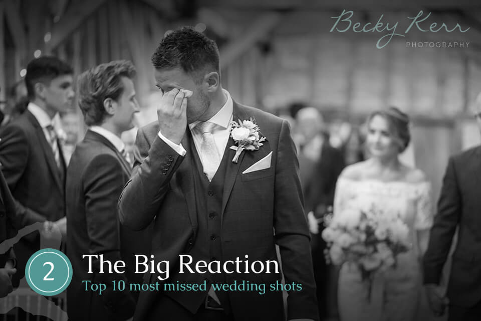 A tearful groom's reaction to seeing the bride for the first time
